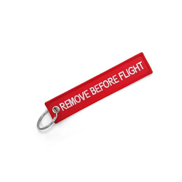 LLAVEROS BORDADOS REMOVE BEFORE FLIGHT