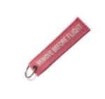 LLAVEROS BORDADOS REMOVE BEFORE FLIGH ROSADO