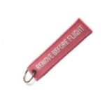 LLAVEROS BORDADOS REMOVE BEFORE FLIGH ROSADO